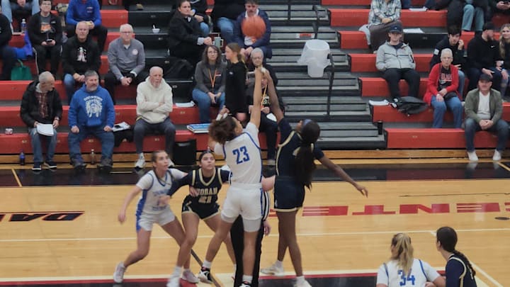 Springboro's McKenzie Jones (left) and Archbishop Hoban's MaKenzie Grant (right) jump to start their game at the Classic at the Country on Saturday, January 17, 2026.