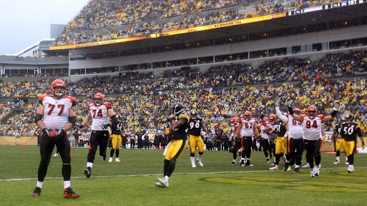 Dec 12, 2010; Pittsburgh , PA, USA; Cincinnati Bengals tackle Andrew Whitworth (77) celebrates a touchdown against the Pittsburgh Steelers during the first half of the game at Heinz Field. Mandatory Credit: Jason Bridge-Imagn Images