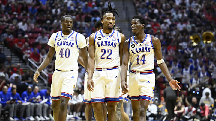 Mar 22, 2026; San Diego, CA, USA; Kansas Jayhawks forward Flory Bidunga (40) and guard Darryn Peterson (22) and guard Melvin Council Jr. (14) look on in the first half against the St. John's Red Storm during a second round game of the men's 2026 NCAA Tournament at Viejas Arena. Mandatory Credit: Denis Poroy-Imagn Images