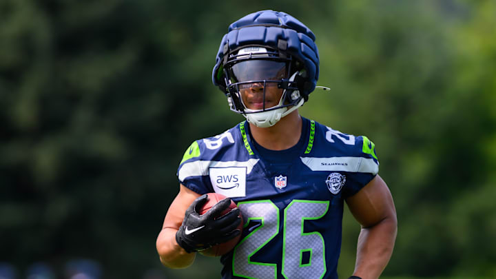 Jul 27, 2024; Renton, WA, USA; Seattle Seahawks running back Zach Charbonnet (26) during training camp at Virginia Mason Athletic Center.