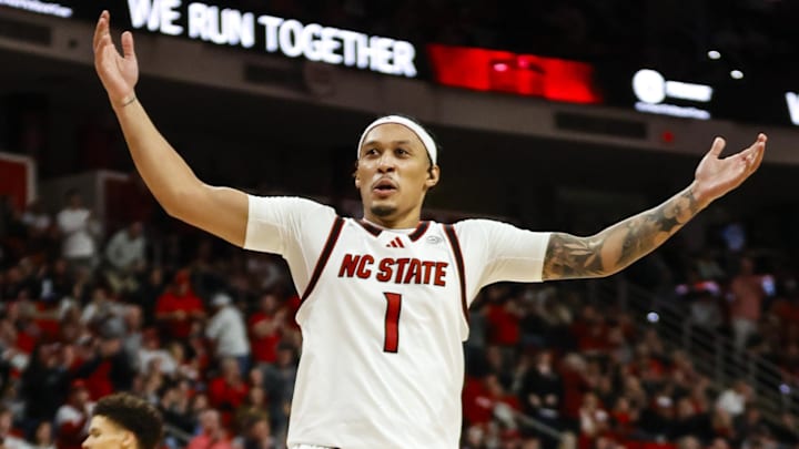 Jan 27, 2026; Raleigh, North Carolina, USA; NC State Wolfpack forward Darrion Williams (1) celebrates during the second half of the game against the Syracuse Orange at Lenovo Center. Mandatory Credit: Jaylynn Nash-Imagn Images