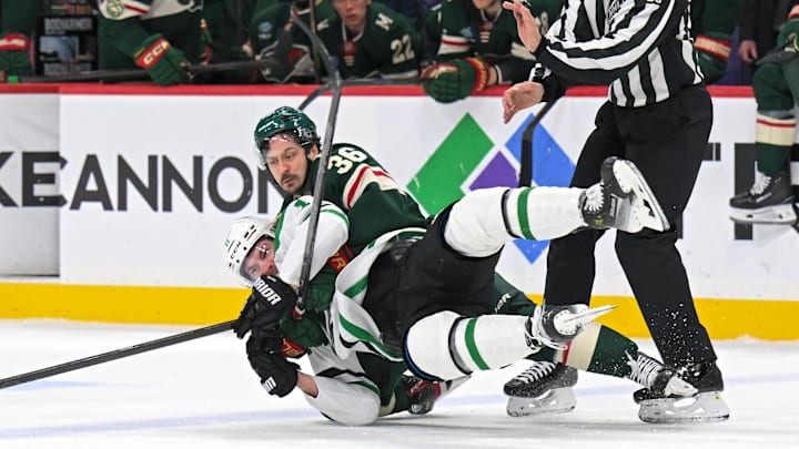 Mar 21, 2026; Saint Paul, Minnesota, USA; Minnesota Wild forward Mats Zuccarello (36) wrestles Dallas Stars forward Nathan Bastian (11) to the ice during the first period at Grand Casino Arena. Mandatory Credit: Nick Wosika-Imagn Images Mar 21, 2026; Saint Paul, Minnesota, USA; Minnesota Wild forward Mats Zuccarello (36) wrestles Dallas Stars forward Nathan Bastian (11) to the ice during the first period at Grand Casino Arena. Mandatory Credit: Nick Wosika-Imagn Images