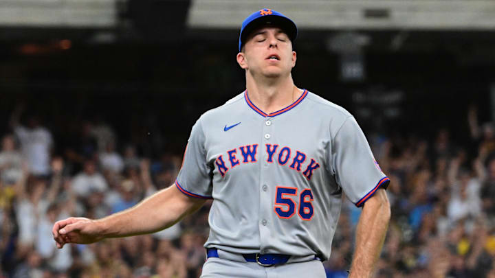 Aug 10, 2025; Milwaukee, Wisconsin, USA; New York Mets pitcher Ryan Helsley (56) reacts after giving up the tying run in the eighth inning against the Milwaukee Brewers at American Family Field. Mandatory Credit: Benny Sieu-Imagn Images Aug 10, 2025; Milwaukee, Wisconsin, USA; New York Mets pitcher Ryan Helsley (56) reacts after giving up the tying run in the eighth inning against the Milwaukee Brewers at American Family Field. Mandatory Credit: Benny Sieu-Imagn Images