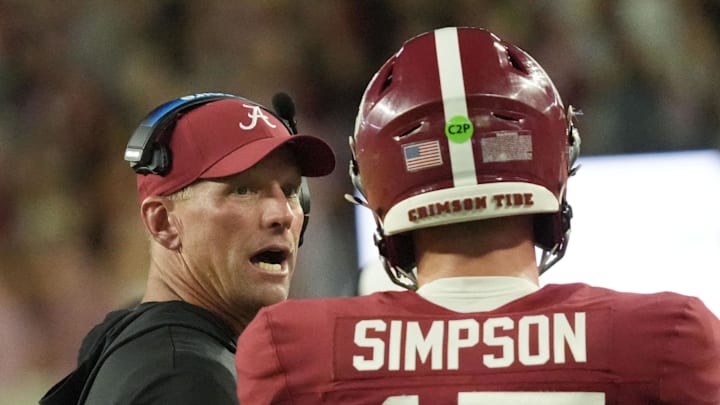Sep 6, 2025; Tuscaloosa, Alabama, USA;  Alabama head coach Kalen DeBoer talks to Alabama quarterback Ty Simpson (15) as Simpson comes off the field after a touchdown drive against UL Monroe at Saban Field at Bryant-Denny Stadium. Mandatory Credit: Gary Cosby Jr.-Imagn Images