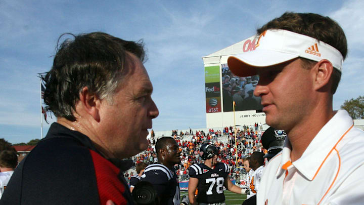 Ole Miss coach Houston Nutt, left, shakes hands with Tennessee coach Lane Kiffin after the Rebels whipped the Vols 42-17 in Oxford, Miss., on Nov. 14, 2009. Ole Miss coach Houston Nutt, left, shakes hands with Tennessee coach Lane Kiffin after the Rebels whipped the Vols 42-17 in Oxford, Miss., on Nov. 14, 2009.