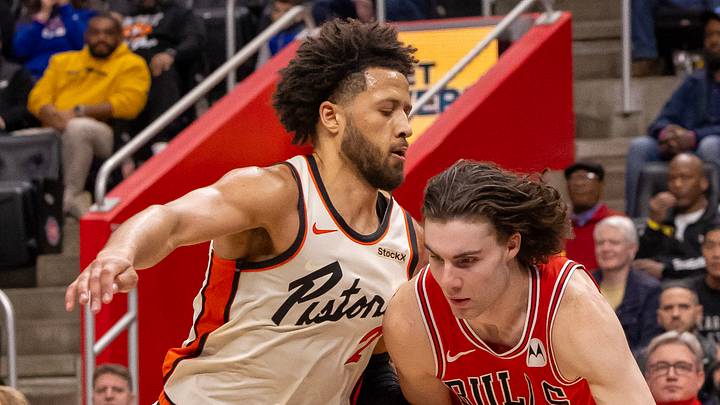 Nov 18, 2024; Detroit, Michigan, USA; Detroit Pistons guard Cade Cunningham (2) defends against Chicago Bulls guard Josh Giddey (3) during the second half at Little Caesars Arena. Mandatory Credit: David Reginek-Imagn Images