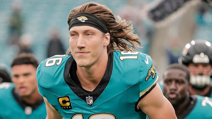 Dec 7, 2025; Jacksonville, Florida, USA;Jacksonville Jaguars quarterback Trevor Lawrence (16) runs toward the locker room after pregame warmups against the Indianapolis Colts at EverBank Stadium. Mandatory Credit: Travis Register-Imagn Images