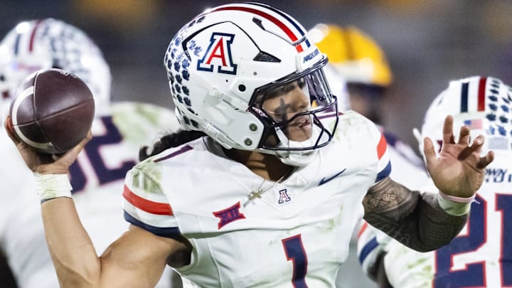 Nov 28, 2025; Tempe, Arizona, USA; Arizona Wildcats quarterback Noah Fifita (1) against the Arizona State Sun Devils in the second half during the 99th Territorial Cup at Mountain America Stadium. Mandatory Credit: Mark J. Rebilas-Imagn Images Nov 28, 2025; Tempe, Arizona, USA; Arizona Wildcats quarterback Noah Fifita (1) against the Arizona State Sun Devils in the second half during the 99th Territorial Cup at Mountain America Stadium. Mandatory Credit: Mark J. Rebilas-Imagn Images