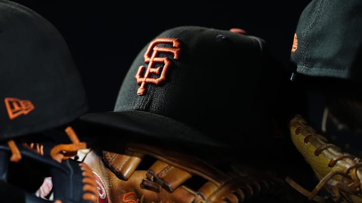 Sep 2, 2025; Denver, Colorado, USA; General view of San Francisco Giants caps and gloves during the sixth inning against the Colorado Rockies at Coors Field. Mandatory Credit: Ron Chenoy-Imagn Images Sep 2, 2025; Denver, Colorado, USA; General view of San Francisco Giants caps and gloves during the sixth inning against the Colorado Rockies at Coors Field. Mandatory Credit: Ron Chenoy-Imagn Images