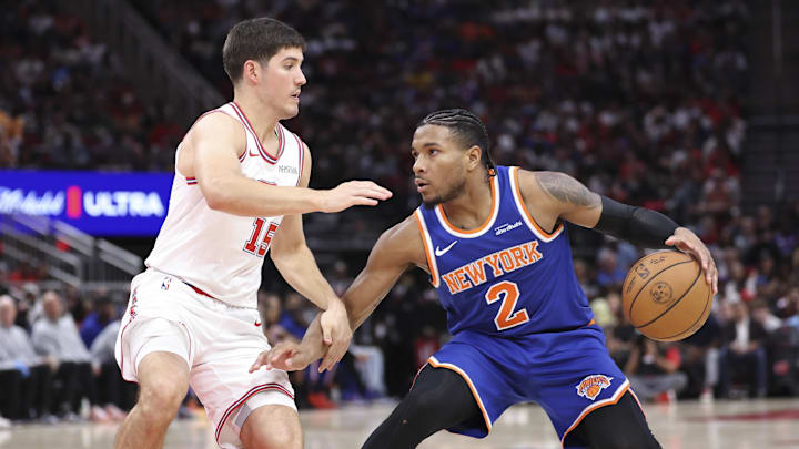 Mar 31, 2026; Houston, Texas, USA; New York Knicks guard Miles McBride (2) controls the ball as Houston Rockets guard Reed Sheppard (15) defends during the third quarter at Toyota Center. Mandatory Credit: Troy Taormina-Imagn Images