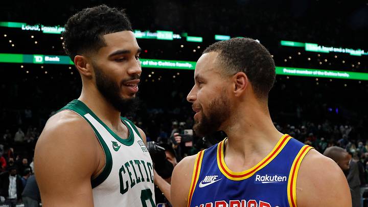 Dec 17, 2021; Boston, Massachusetts, USA; Boston Celtics forward Jayson Tatum (0) talks with Golden State Warriors guard Stephen Curry (30) after their game at TD Garden. Mandatory Credit: Winslow Townson-USA TODAY Sports