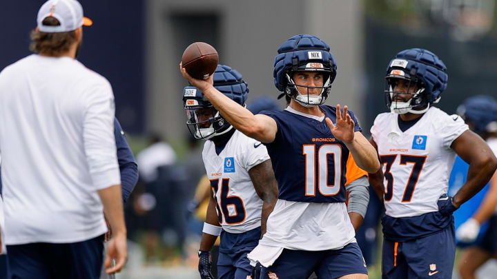 Jul 26, 2024; Englewood, CO, USA; Denver Broncos quarterback Bo Nix (10) during training camp at Broncos Park Powered by CommonSpirit. Jul 26, 2024; Englewood, CO, USA; Denver Broncos quarterback Bo Nix (10) during training camp at Broncos Park Powered by CommonSpirit.