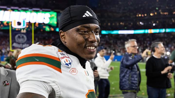 Jan 8, 2026; Glendale, AZ, USA; Miami Hurricanes defensive back Keionte Scott (0) celebrates after defeating the Mississippi Rebels during the 2026 Fiesta Bowl and semifinal game of the College Football Playoff at State Farm Stadium. Mandatory Credit: Mark J. Rebilas-Imagn Images Jan 8, 2026; Glendale, AZ, USA; Miami Hurricanes defensive back Keionte Scott (0) celebrates after defeating the Mississippi Rebels during the 2026 Fiesta Bowl and semifinal game of the College Football Playoff at State Farm Stadium. Mandatory Credit: Mark J. Rebilas-Imagn Images