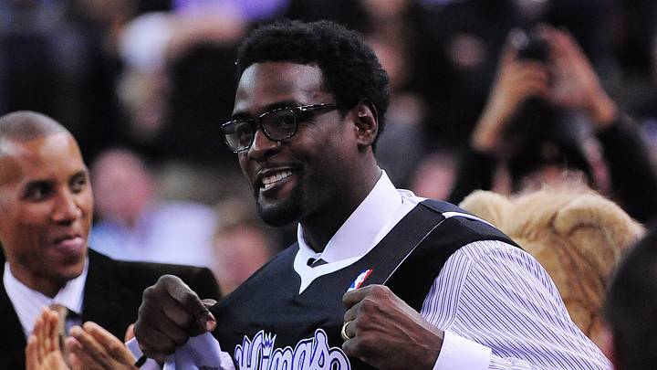 February 9, 2012; Sacramento, CA, USA; Sacramento Kings former player Chris Webber (right) holds his jersey as former Indiana Pacers player Reggie Miller (left) looks on during the first quarter against the Oklahoma City Thunder at Power Balance Pavilion. Mandatory Credit: Kyle Terada-USA TODAY Sports