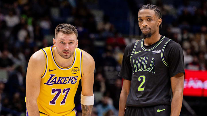 Jan 6, 2026; New Orleans, Louisiana, USA;  Los Angeles Lakers forward/guard Luka Doncic (77) looks on against New Orleans Pelicans forward Herbert Jones (2) during the second half at Smoothie King Center. Mandatory Credit: Stephen Lew-Imagn Images