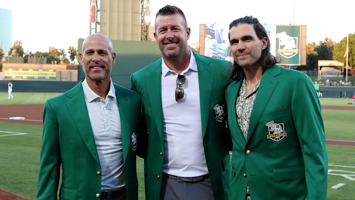 Sep 13, 2025; West Sacramento, California, USA;  Former Athletics pitchers from left to right (Tim Hudsun, Mark Mulder, and Barry Zito) pose for a photo before the start of a game against the Cincinnati Reds  at Sutter Health Park. Mandatory Credit: Dennis Lee-Imagn Images