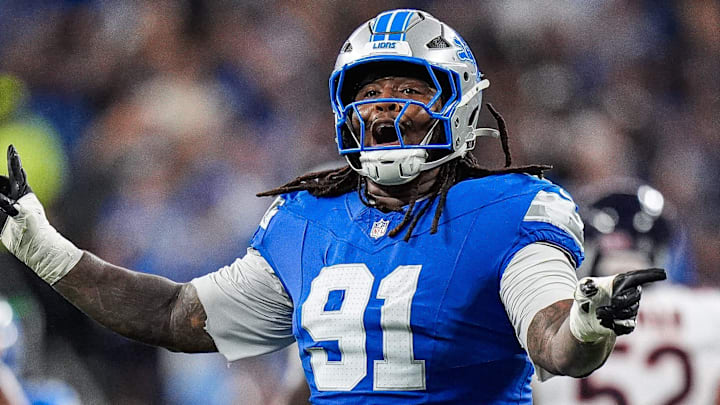 Detroit Lions defensive tackle Tyleik Williams (91) celebrates a play against Chicago Bears 