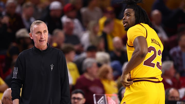 Jan 24, 2026; Tempe, Arizona, USA; Arizona State Sun Devils head coach Bobby Hurley with forward Allen Mukeba (23) against the Cincinnati Bearcats at Desert Financial Arena. Mandatory Credit: Mark J. Rebilas-Imagn Images Jan 24, 2026; Tempe, Arizona, USA; Arizona State Sun Devils head coach Bobby Hurley with forward Allen Mukeba (23) against the Cincinnati Bearcats at Desert Financial Arena. Mandatory Credit: Mark J. Rebilas-Imagn Images