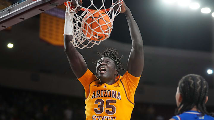 ASU Sun Devils center Massamba Diop (35) dunks the ball against the Kansas Jayhawks at Desert Financial Arena in Tempe on March 3, 2026.