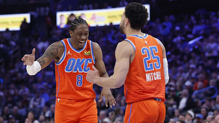 Jan 11, 2026; Oklahoma City, Oklahoma, USA; Oklahoma City Thunder guard/forward Jalen Williams (8) and guard Ajay Mitchell (25) celebrate after scoring against the Miami Heat during the second half at Paycom Center. Mandatory Credit: Alonzo Adams-Imagn Images