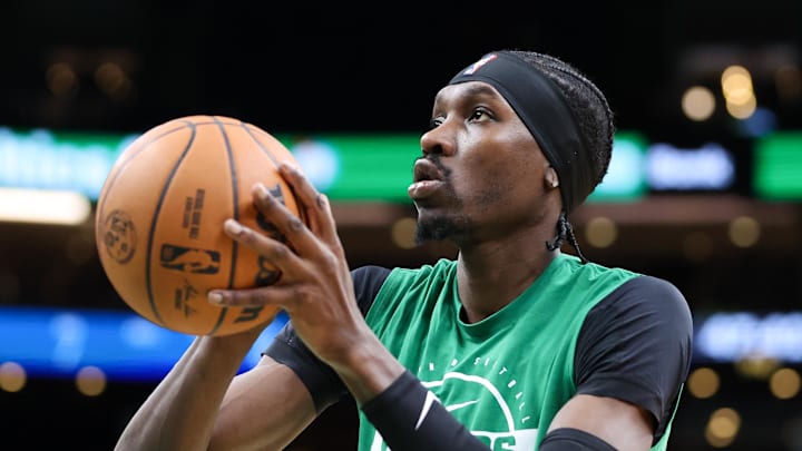 Nov 16, 2025; Boston, Massachusetts, USA; Boston Celtics center Chris Boucher (99) warms up before a game against the Los Angeles Clippers at TD Garden. Mandatory Credit: Paul Rutherford-Imagn Images