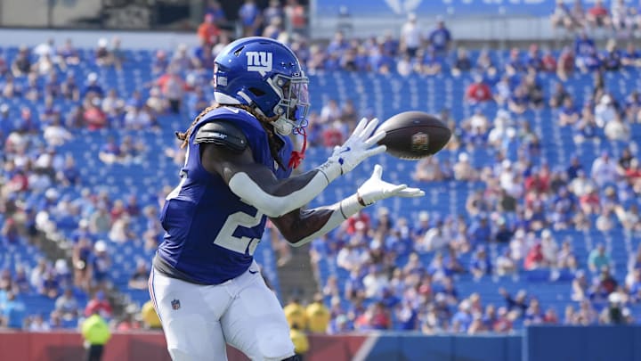 Aug 9, 2025; Orchard Park, New York, USA; New York Giants safety Anthony Johnson Jr. (23) catches a pass for a touchdown against the Buffalo Bills during the second half at Highmark Stadium. Mandatory Credit: Gregory Fisher-Imagn Images