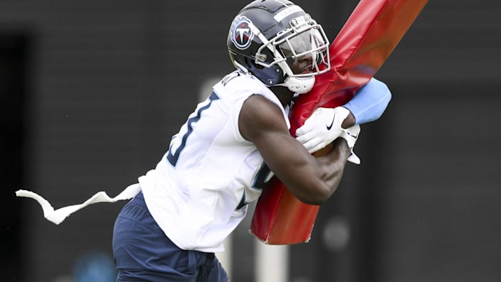 May 10, 2025; Nashville, TN, USA;  Tennessee Titans outside linebacker Oluwafemi Oladejo (53) goes through drills during Rookie Mini Camp at Saint Thomas Sports Park. Mandatory Credit: Steve Roberts-Imagn Images