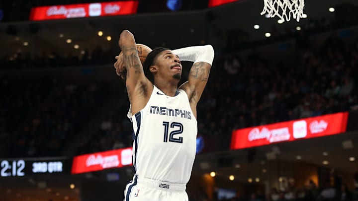 Feb 25, 2023; Memphis, Tennessee, USA; Memphis Grizzlies guard Ja Morant (12) dunks during the second half against the Denver Nuggets at FedExForum. Mandatory Credit: Petre Thomas-Imagn Images Feb 25, 2023; Memphis, Tennessee, USA; Memphis Grizzlies guard Ja Morant (12) dunks during the second half against the Denver Nuggets at FedExForum. Mandatory Credit: Petre Thomas-Imagn Images