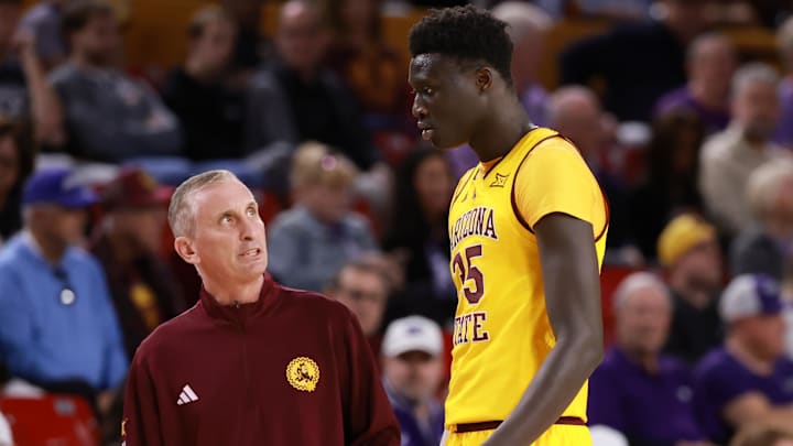 Jan 10, 2026; Tempe, Arizona, USA; Arizona State Sun Devils head coach Bobby Hurley with center Massamba Diop (35) against the Kansas State Wildcats in the second half at Desert Financial Arena. Mandatory Credit: Mark J. Rebilas-Imagn Images