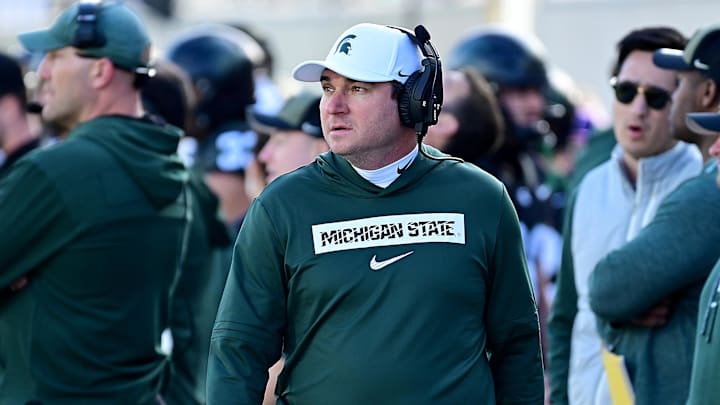 Nov 2, 2024; East Lansing, Michigan, USA;  Michigan State Spartans head coach Jonathan Smith looks over his sidelines during the first quarter against the Indiana Hoosiers at Spartan Stadium. Mandatory Credit: Dale Young-Imagn Images