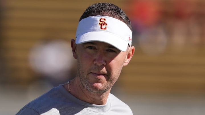 Oct 28, 2023; Berkeley, California, USA; USC Trojans head coach Lincoln Riley walks on the field before a game against the California Golden Bears at California Memorial Stadium. Mandatory Credit: Darren Yamashita-Imagn Images Oct 28, 2023; Berkeley, California, USA; USC Trojans head coach Lincoln Riley walks on the field before a game against the California Golden Bears at California Memorial Stadium. Mandatory Credit: Darren Yamashita-Imagn Images