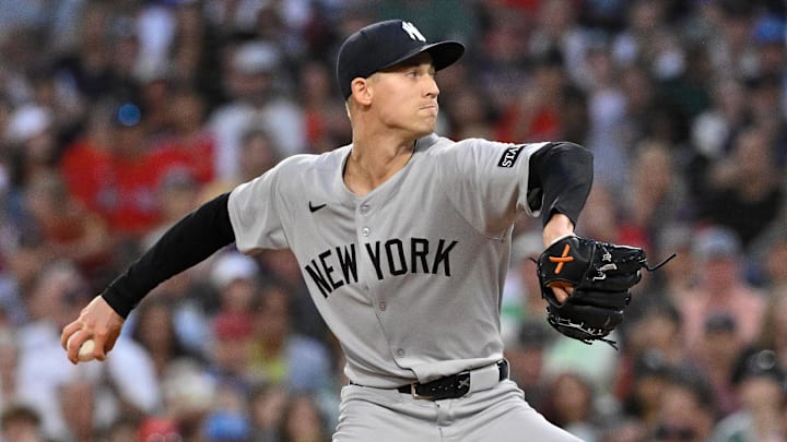 Sep 13, 2025; Boston, Massachusetts, USA; New York Yankees relief pitcher Luke Weaver (30) pitches against the Boston Red Sox during sixth inning  at Fenway Park. Mandatory Credit: Eric Canha-Imagn Images
