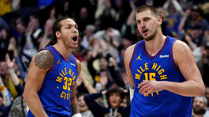 Jan 23, 2025; Denver, Colorado, USA; Denver Nuggets center Nikola Jokic (15) reacts along side forward Aaron Gordon (32)  following a full court basket made in the second half against the Sacramento Kings at Ball Arena.
