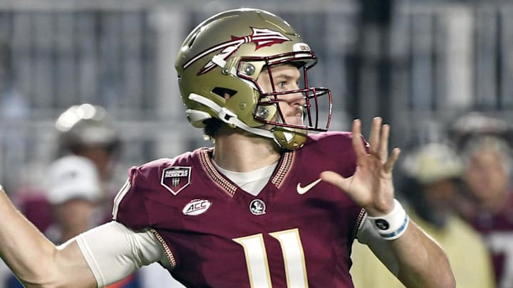 Oct 5, 2024; Tallahassee, Florida, USA; Florida State Seminoles quarterback Brock Glenn (11) throws the ball against the Clemson Tigers during the first half at Doak S. Campbell Stadium. Mandatory Credit: Melina Myers-Imagn Images