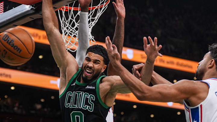 Apr 28, 2026; Boston, Massachusetts, USA; Philadelphia 76ers guard Quentin Grimes (5) and forward Paul George (8) defend against Boston Celtics forward Jayson Tatum (0) in the second half during game five of the first round of the 2026 NBA Playoffs at TD Garden. Mandatory Credit: David Butler II-Imagn Images