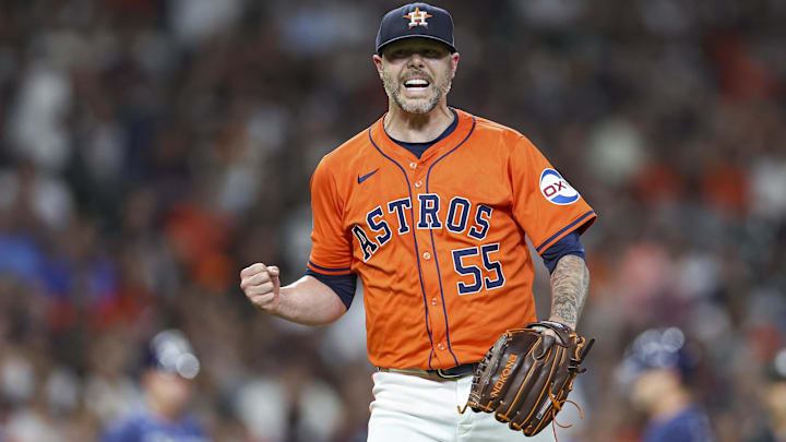Aug 2, 2024; Houston, Texas, USA; Houston Astros relief pitcher Ryan Pressly (55) reacts after getting an out during the eighth inning against the Tampa Bay Rays at Minute Maid Park