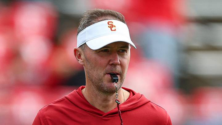 Sep 19, 2026; Piscataway, New Jersey, USA; USC Trojans head coach Lincoln Riley on the field during warm ups before the game against the Rutgers Scarlet Knights at SHI Stadium. Mandatory Credit: Vincent Carchietta-Imagn Images Sep 19, 2026; Piscataway, New Jersey, USA; USC Trojans head coach Lincoln Riley on the field during warm ups before the game against the Rutgers Scarlet Knights at SHI Stadium. Mandatory Credit: Vincent Carchietta-Imagn Images