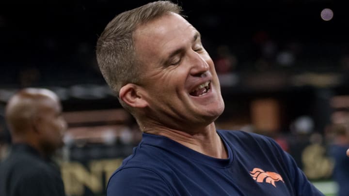 Aug 23, 2025; New Orleans, Louisiana, USA; Denver Broncos special teams coordinator/assistant head coach Darren Rizzi greets New Orleans Saints owner Gayle Benson on the sideline at Caesars Superdome. Aug 23, 2025; New Orleans, Louisiana, USA; Denver Broncos special teams coordinator/assistant head coach Darren Rizzi greets New Orleans Saints owner Gayle Benson on the sideline at Caesars Superdome.