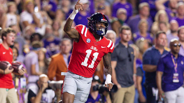Oct 12, 2024; Baton Rouge, Louisiana, USA; Mississippi Rebels linebacker Chris Paul Jr. (11) reacts after an interception by defensive tackle Jamarious Brown (not pictured) against the LSU Tigers during the first half at Tiger Stadium. Mandatory Credit: Stephen Lew-Imagn Images Oct 12, 2024; Baton Rouge, Louisiana, USA; Mississippi Rebels linebacker Chris Paul Jr. (11) reacts after an interception by defensive tackle Jamarious Brown (not pictured) against the LSU Tigers during the first half at Tiger Stadium. Mandatory Credit: Stephen Lew-Imagn Images