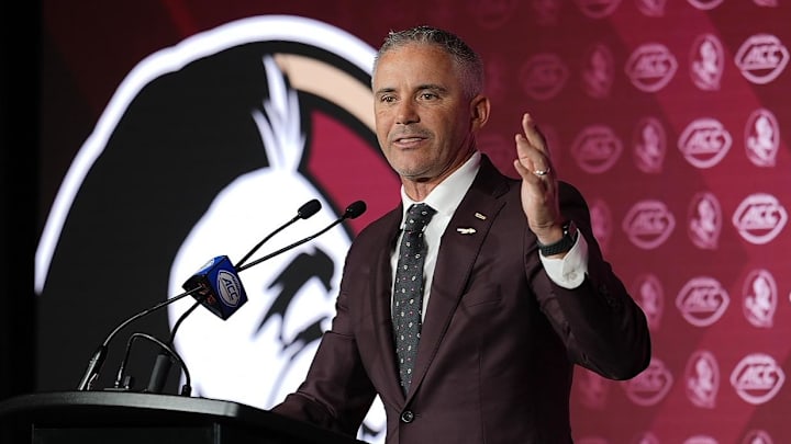 Jul 23, 2025; Charlotte, NC, USA; Florida State head coach Mike Norvell answers questions from the media during ACC Media days at Hilton Charlotte Uptown. Mandatory Credit: Jim Dedmon-Imagn Images