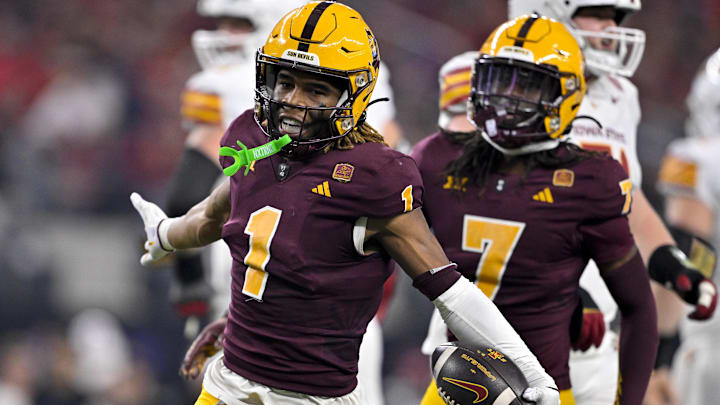 Dec 7, 2024; Arlington, TX, USA; Arizona State Sun Devils defensive back Keith Abney II (1) and defensive back Shamari Simmons (7) celebrate during the game between the Iowa State Cyclones and the Arizona State Sun Devils at AT&T Stadium. Mandatory Credit: Jerome Miron-Imagn Images