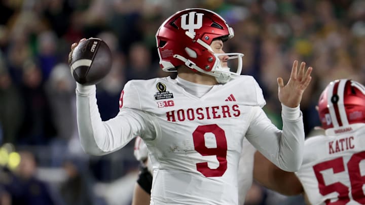 Dec 20, 2024; Notre Dame, Indiana, USA; Indiana Hoosiers quarterback Kurtis Rourke (9) throws during the second half against the Notre Dame Fighting Irish at Notre Dame Stadium. Mandatory Credit: Trevor Ruszkowski-Imagn Images
