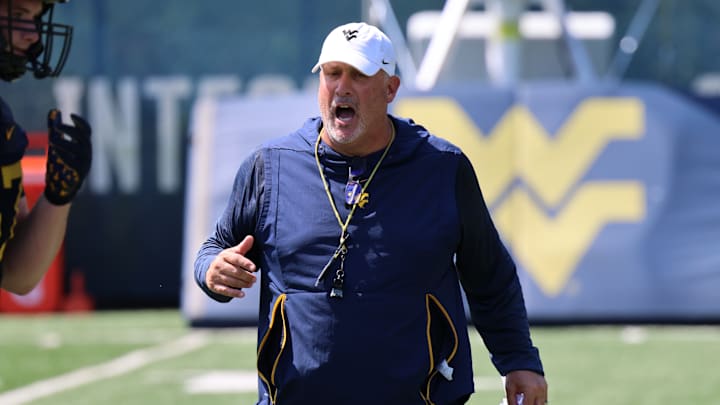 West Virginia University offensive line coach Matt Moore. West Virginia University offensive line coach Matt Moore.