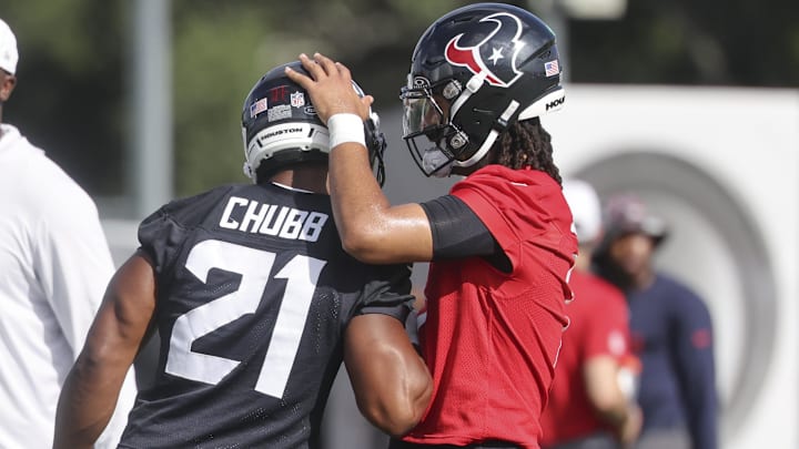  Houston Texans quarterback C.J. Stroud (7) and running back Nick Chubb (21) during training camp at Houston Methodist Training Center.