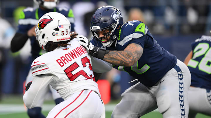 Nov 24, 2024; Seattle, Washington, USA; Seattle Seahawks offensive tackle Abraham Lucas (72) blocks Arizona Cardinals linebacker Baron Browning (53) during the second half at Lumen Field. Mandatory Credit: Steven Bisig-Imagn Images