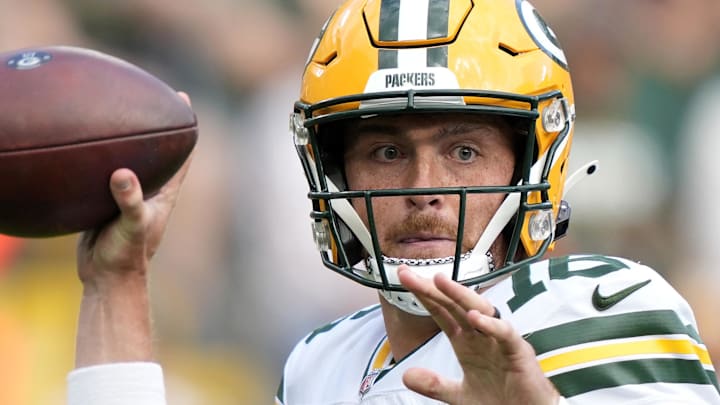 Green Bay Packers quarterback Sean Clifford (16) throws during the first half against the Seattle Seahawks at Lambeau Field.