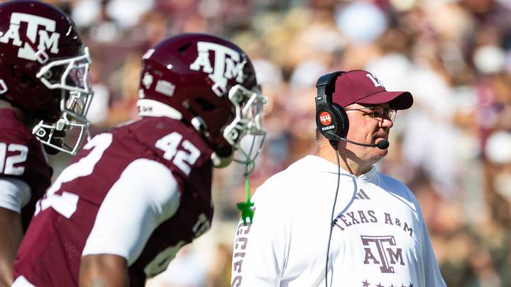 Texas A&M Aggies head coach Mike Elko on the field in the second half of a game against the Samford Bulldogs at Kyle Field. Texas A&M Aggies head coach Mike Elko on the field in the second half of a game against the Samford Bulldogs at Kyle Field.
