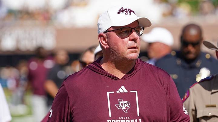 Texas A&M Aggies head coach Mike Elko leaves the field after the first half against the Missouri Tigers during the first half of the game at Faurot Field at Memorial Stadium. Texas A&M Aggies head coach Mike Elko leaves the field after the first half against the Missouri Tigers during the first half of the game at Faurot Field at Memorial Stadium.