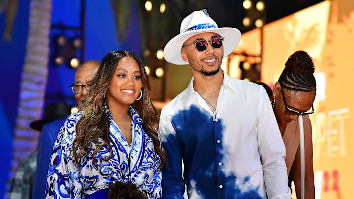 Mookie Betts of the Los Angeles Dodgers with wife Brianna during the Red Carpet Show at L.A. Live. 