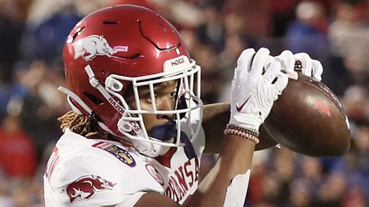 Arkansas Razorbacks tight end Ty Washington (8) scores a touchdown in the first quarter against the Kansas Jayhawks